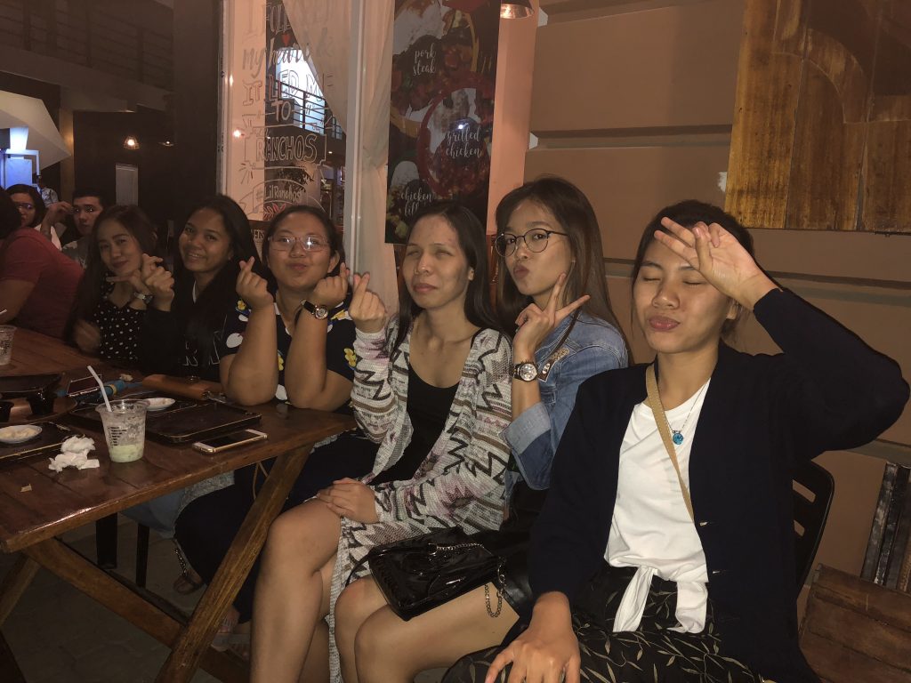 Jasmin and friends at a restaurant.